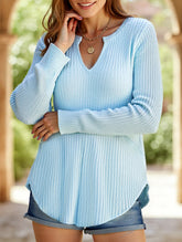 Loose solid color V-neck curved sweater